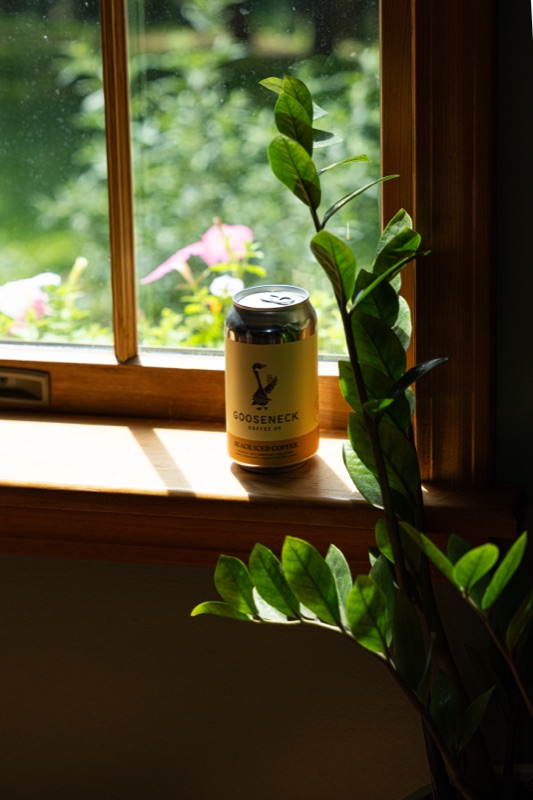 A coffee can on a sunny windowsill